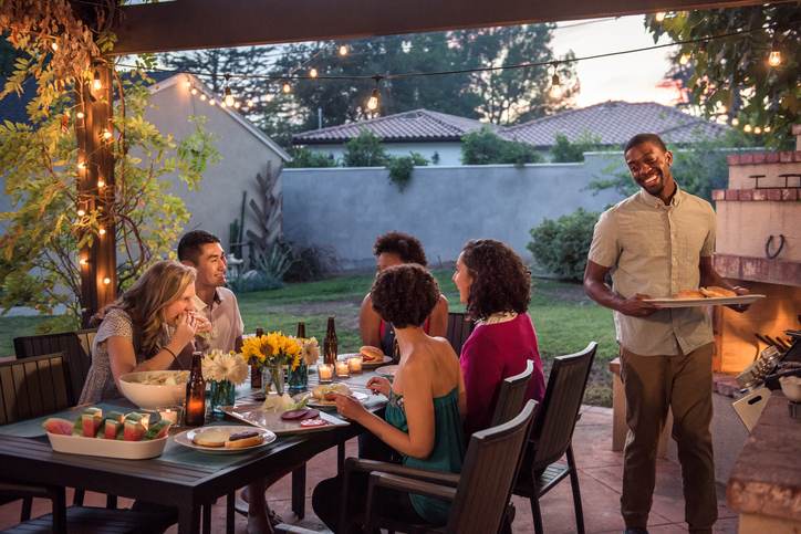 Hipsters Grilling at a Summer Backyard BBQ